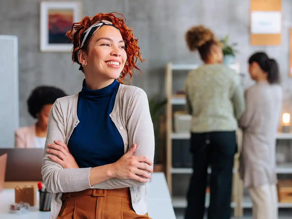 Woman standing with her arms crossed